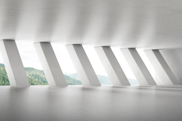 istock 3d render of empty concrete room with large window and column structure on nature background. 1318418037