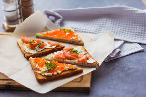 istock sandwiches or tapas of bread red caviar and red fish 1318421739