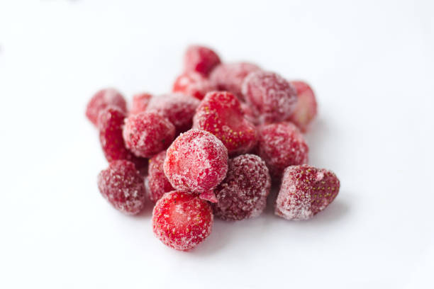 istock Close up frozen strawberries 1318421845
