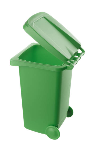 istock Plastic green trash can isolated on white background 1318423176