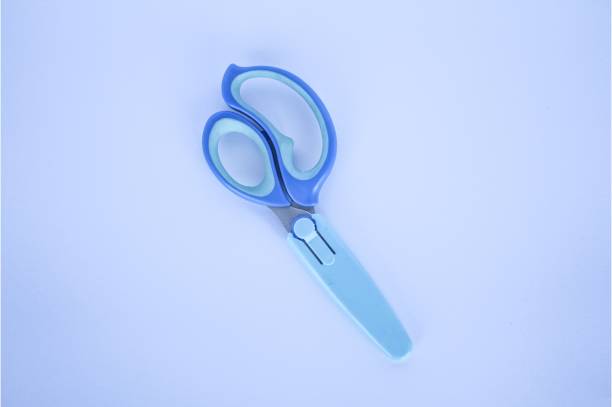 istock A pair of blue craft scissors for kids 1318423601
