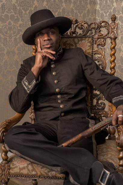 istock African traditionally dressed european man with a weapon 1318427895