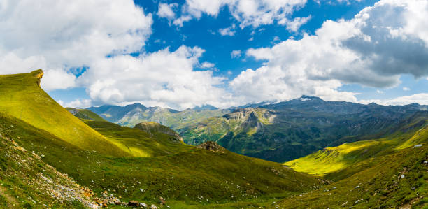 Austrian alps in early autumn - mountain range in clouds. Mountains landscape.