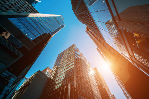 istock Abstract background from closeup glasses window on modern building 1318432191