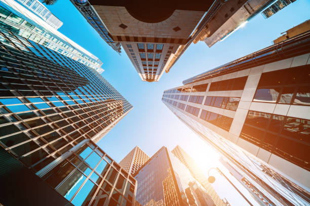 istock Abstract background from closeup glasses window on modern building 1318432474
