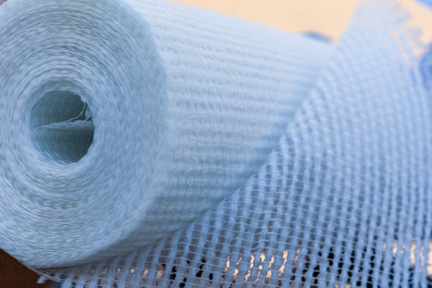 Water filter cartridges new and used, with coal and with rusty brown coloring. Clean water and healthy lifestyle concept. Evidence of contamination of tap water with iron cations, activated carbon block and ultra filtration membrane. Close up.