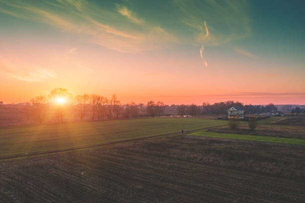 Colorful cloudy sky at sunset. Sunset over the countryside