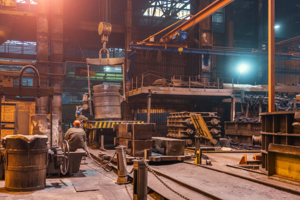 istock Large ladle container for iron casting in metallurgical factory inside, heavy industry 1318435308