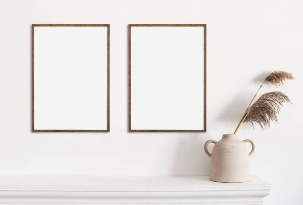 istock Artwork mock-up in interior design. Blank picture frame template on white wall 1318436434
