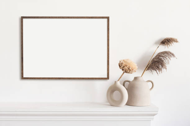 istock Artwork mock-up in interior design. Blank picture frame template on white wall 1318436455