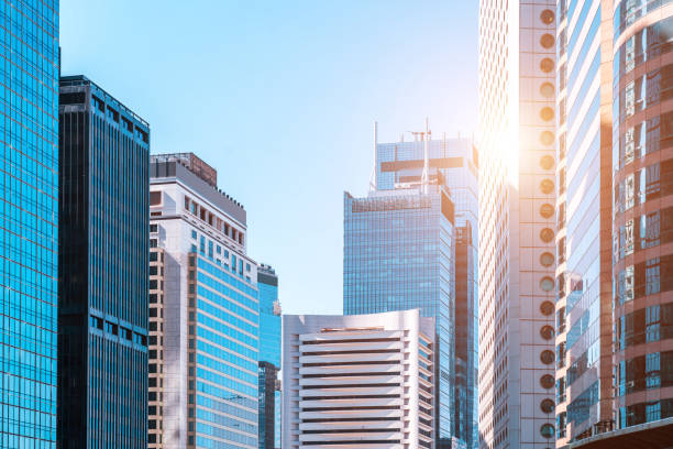 istock Abstract background from closeup glasses window on modern building 1318439200