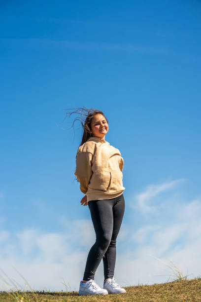 istock Thirteen year old outdoor portrait 1318441775