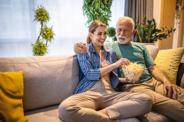 istock Relaxing at home with tv 1318444312