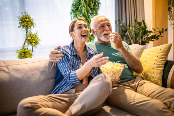 istock Relaxing at home with tv 1318444692