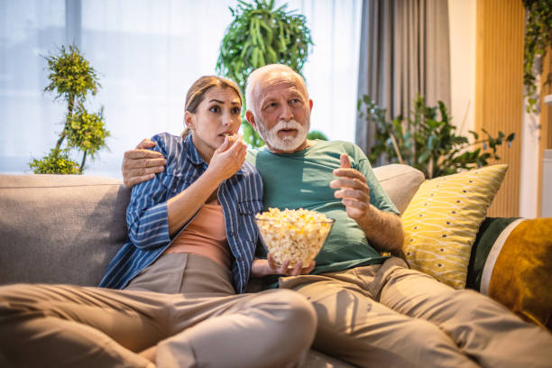 istock Watching movie together 1318444789