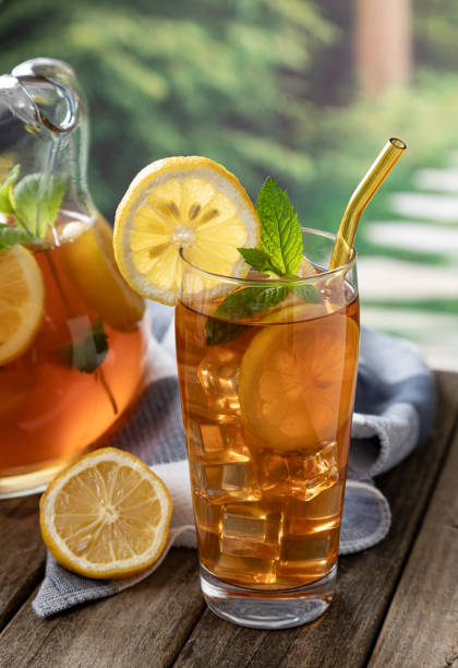 istock Glass of Iced Tea With Lemon Slices 1318449430