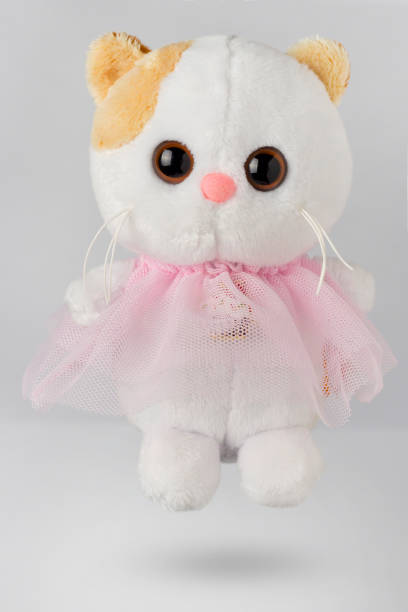 istock Plush white cat toy. A cat with a red ear. 1318450641
