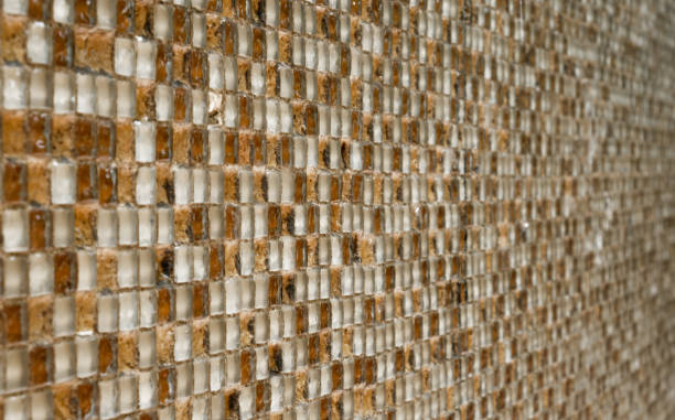istock Glass and ceramic tile pattern with warm light and limited depth of focus 1318454199