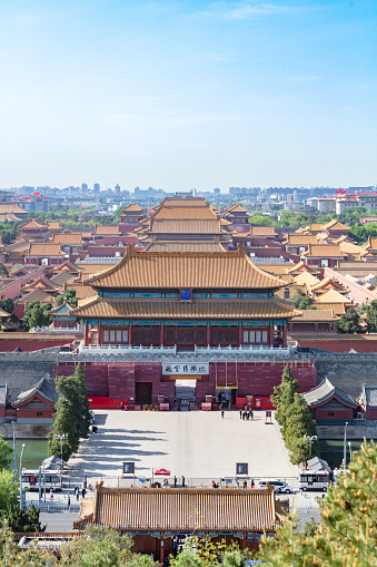 Beijing, China - October 18, 2015: Elevated view of the Forbidden City in Beijing, China. The Forbidden City was declared a World Heritage Site in 1987 and is listed by UNESCO as the largest collection of preserved ancient wooden structures in the world.