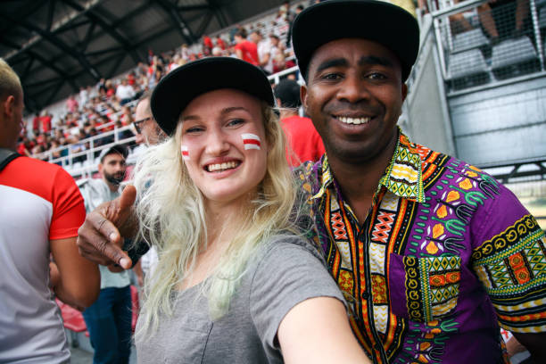 istock Friends fan selfie at sport event 1318457281