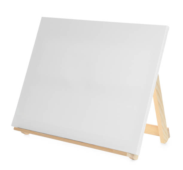 istock Wooden easel with blank canvas isolated on white 1318458885