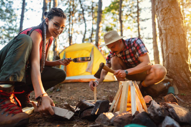 istock Young couple camping in the forest 1318461380