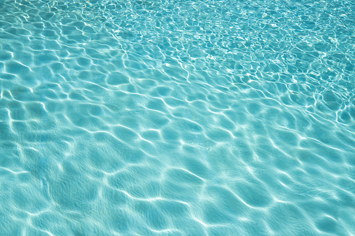 Shiny Blue Water Background. Abstract Clean Pool