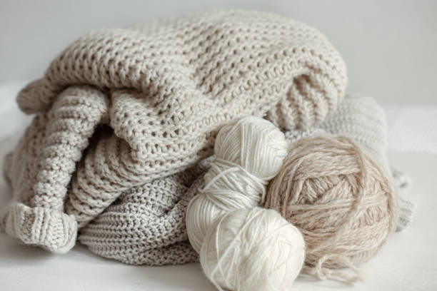istock Cozy composition with knitted yarn in pastel colors. 1318462872