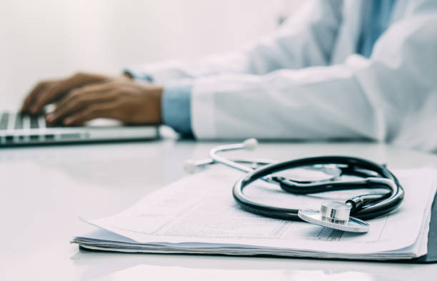 istock doctor at work in hospital office. 1318466746