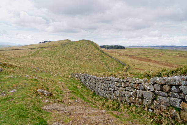 istock Hadrians Wall crossing the rugged Northumbrian landscape 1318469764