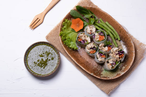 istock Suan Noodle with chicken and vegetables in a plate on a white background. 1318469895