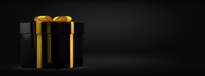 Celebration concept: 3D rendered present on black background with copy space. A wrapped black box with yellow ribbon. Greetings for Mother's day, Father's day, Christmas, Birthday, Valentine's day and other holidays