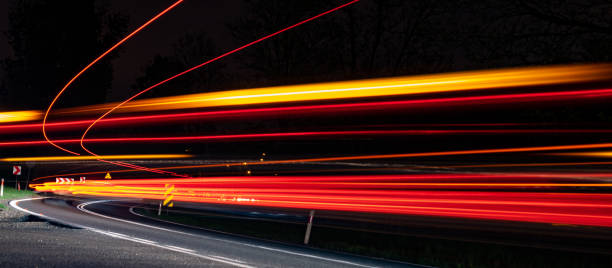 istock abstract red car lights at night. long exposure 1318472579