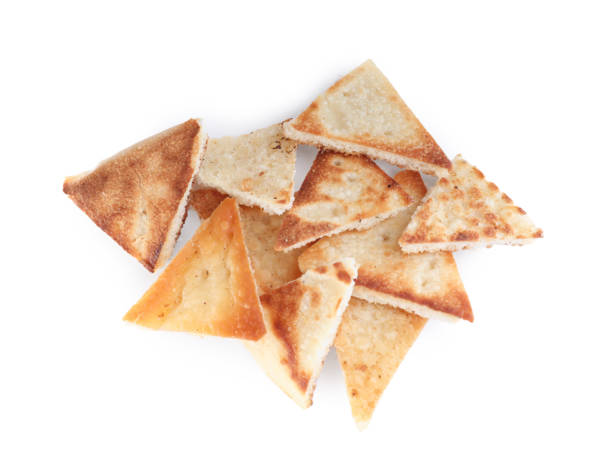 Delicious pita chips on white background, top view Delicious pita chips on white background, top view pita bread stock pictures, royalty-free photos & images