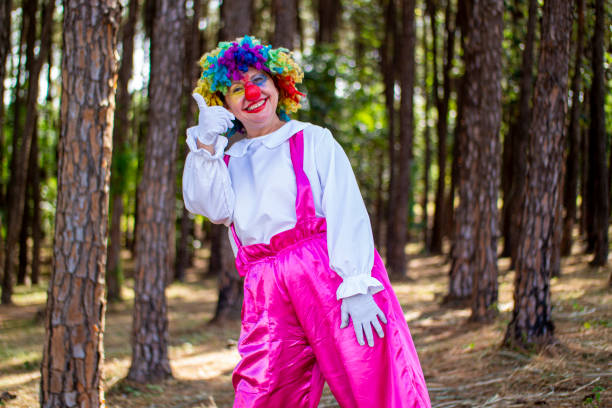 istock Woman in clown costume. 1318475497