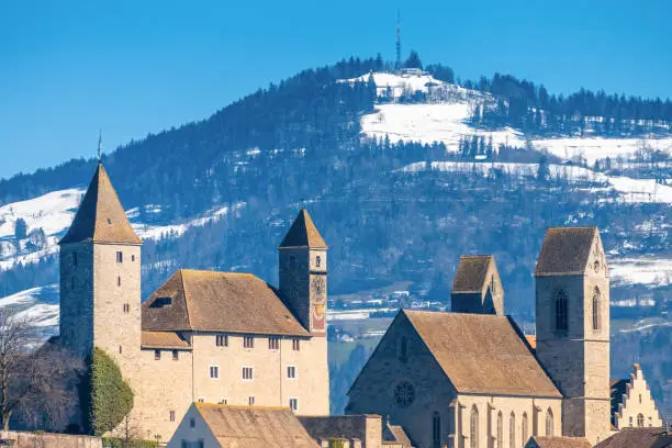 Photo of Skyline of the old city of Rapperswil,  St. Gallen, with Bachtel mountain in the Zurich Oberland in the backgroundf,Switzerland