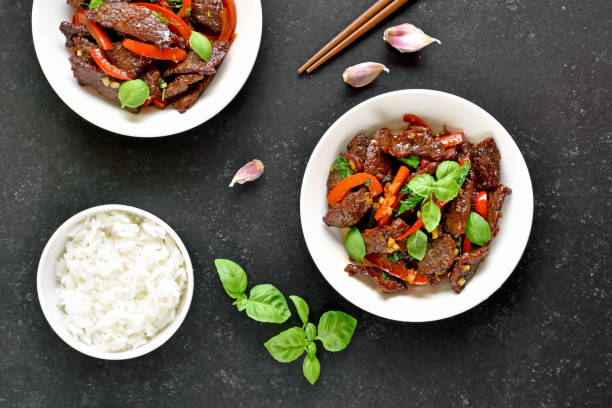 istock Thai style stir-fry beef with vegetables in bowl 1318478868