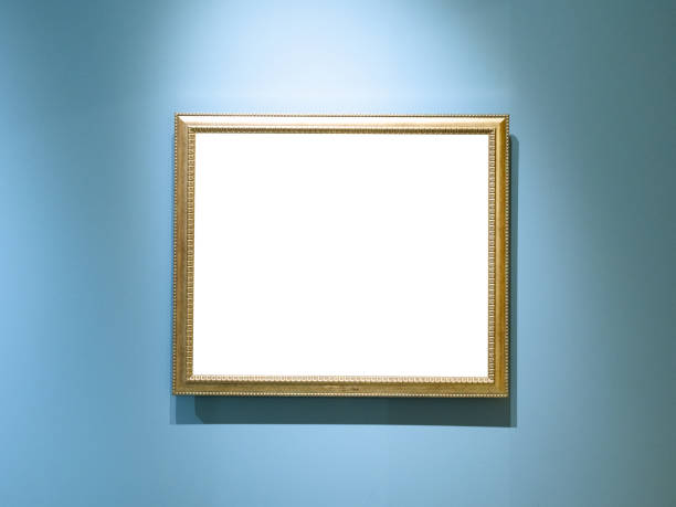istock old narrow silver wood picture frame on blue wall 1318479254