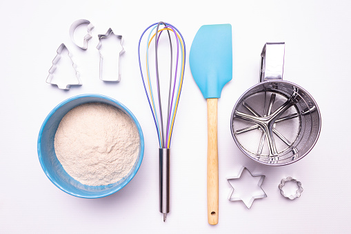 Kitchenware for baking cookies on a white background. Flat lay.