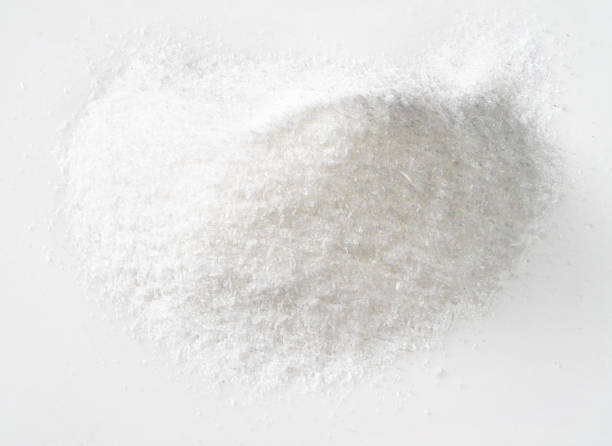 istock pile of crystalline monosodium glutamate on white 1318484621