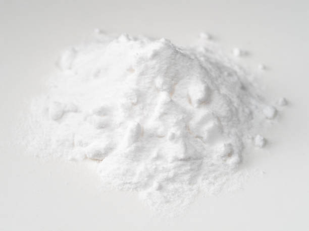 istock handful of baking soda closeup on white 1318484662