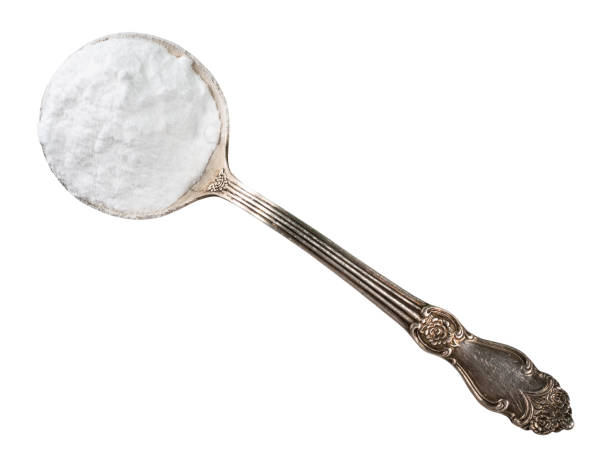 istock baking soda in silver tablespoon cutout 1318486091