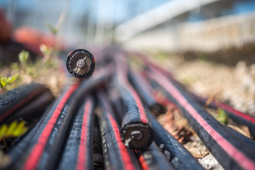 Group of fiber optic cables in the process of installation.