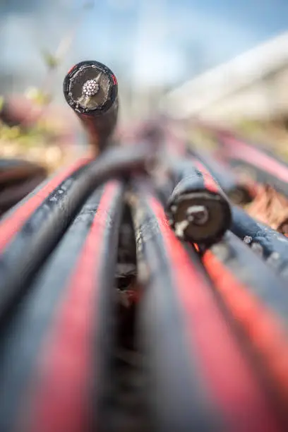 Group of fiber optic cables in the process of installation.