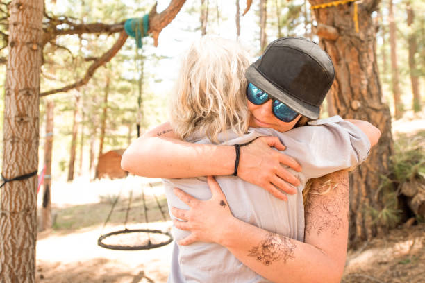 istock Family reuniting with hugs and love 1318489155