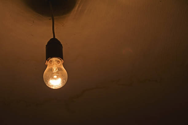 istock Incandescent lamp in the corridor close-up 1318491943