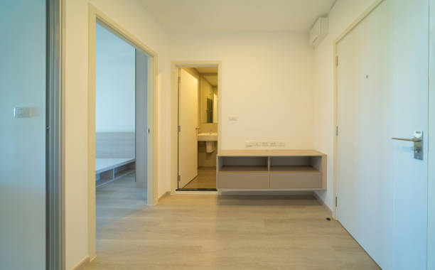 istock Empty room in condominium or apartment with space. Interior design. New modern unfurnished room rental property, living space units. lifestyle. 1318502063