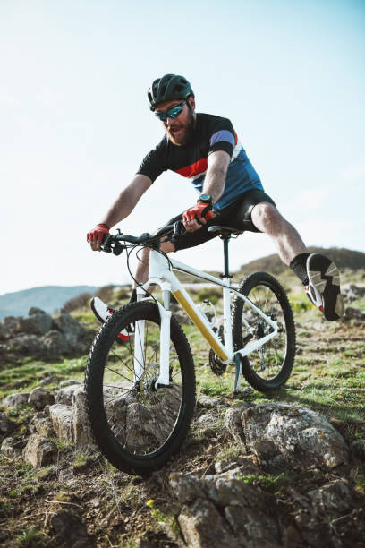 istock Male Cyclist Excited During Downhill Mountain Biking 1318502368