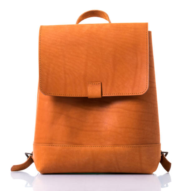 istock Brown backpack genuine leather on the white background. Modern leather backpack front view 1318503460