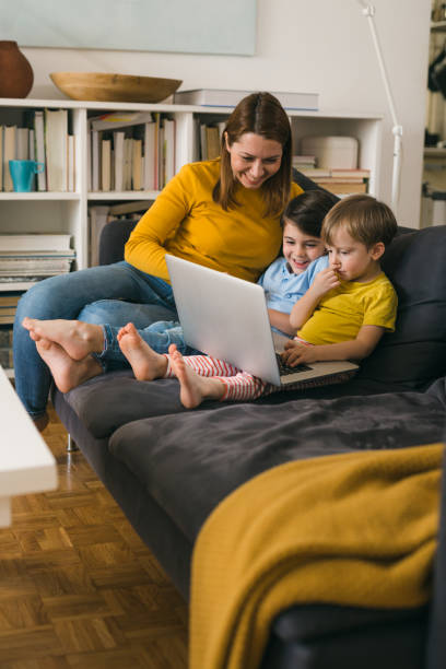 istock mother and kids at home 1318504588